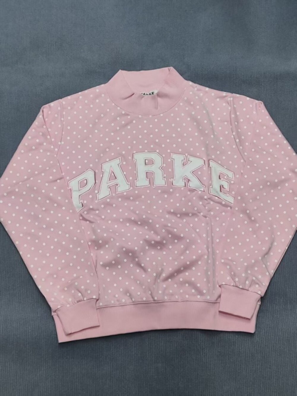 PARKE All-over Pink Polka Dot Varsity Mock Neck Sweatshirts